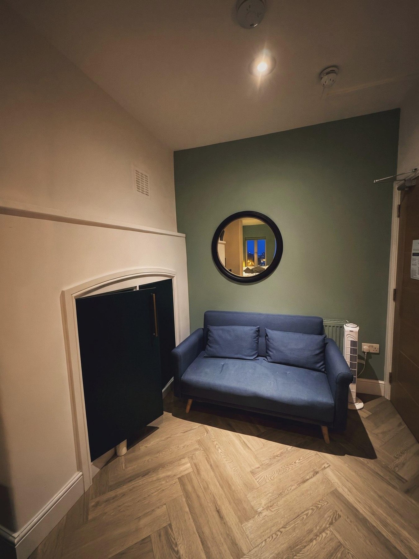 A top-floor room at night