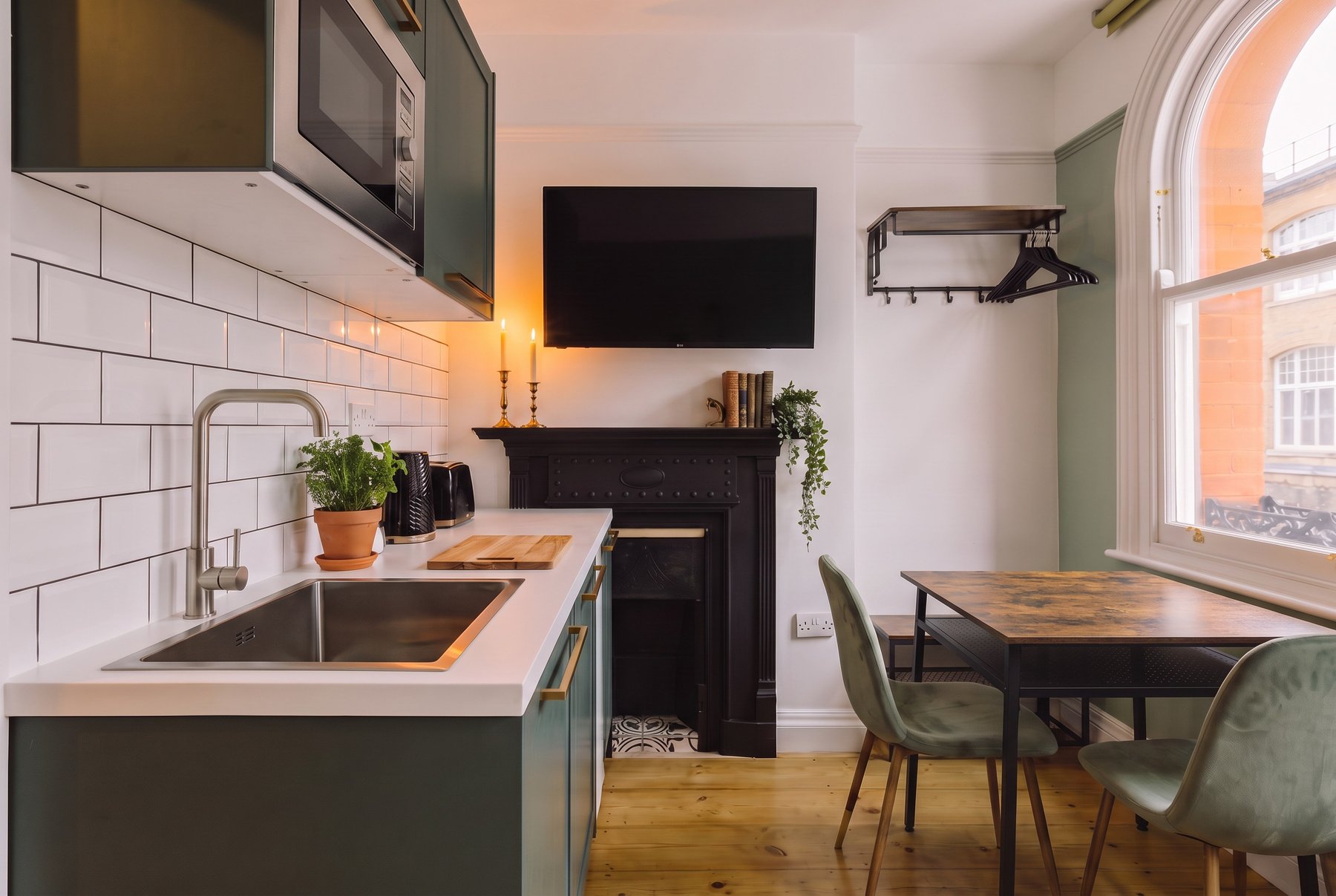 The hearth room with a square dining table for two