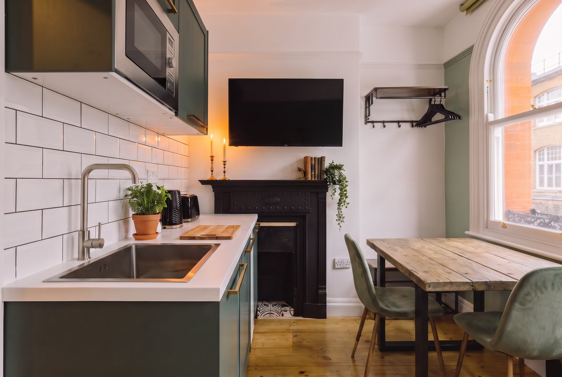 The hearth room with the reclaimed ASPA dining table
